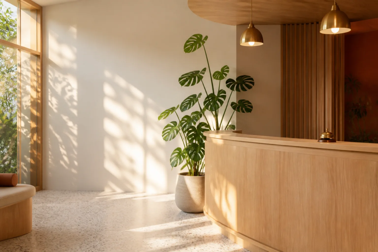 Warm clinic reception counter, plants, pendant lights, sunlight (representative image)